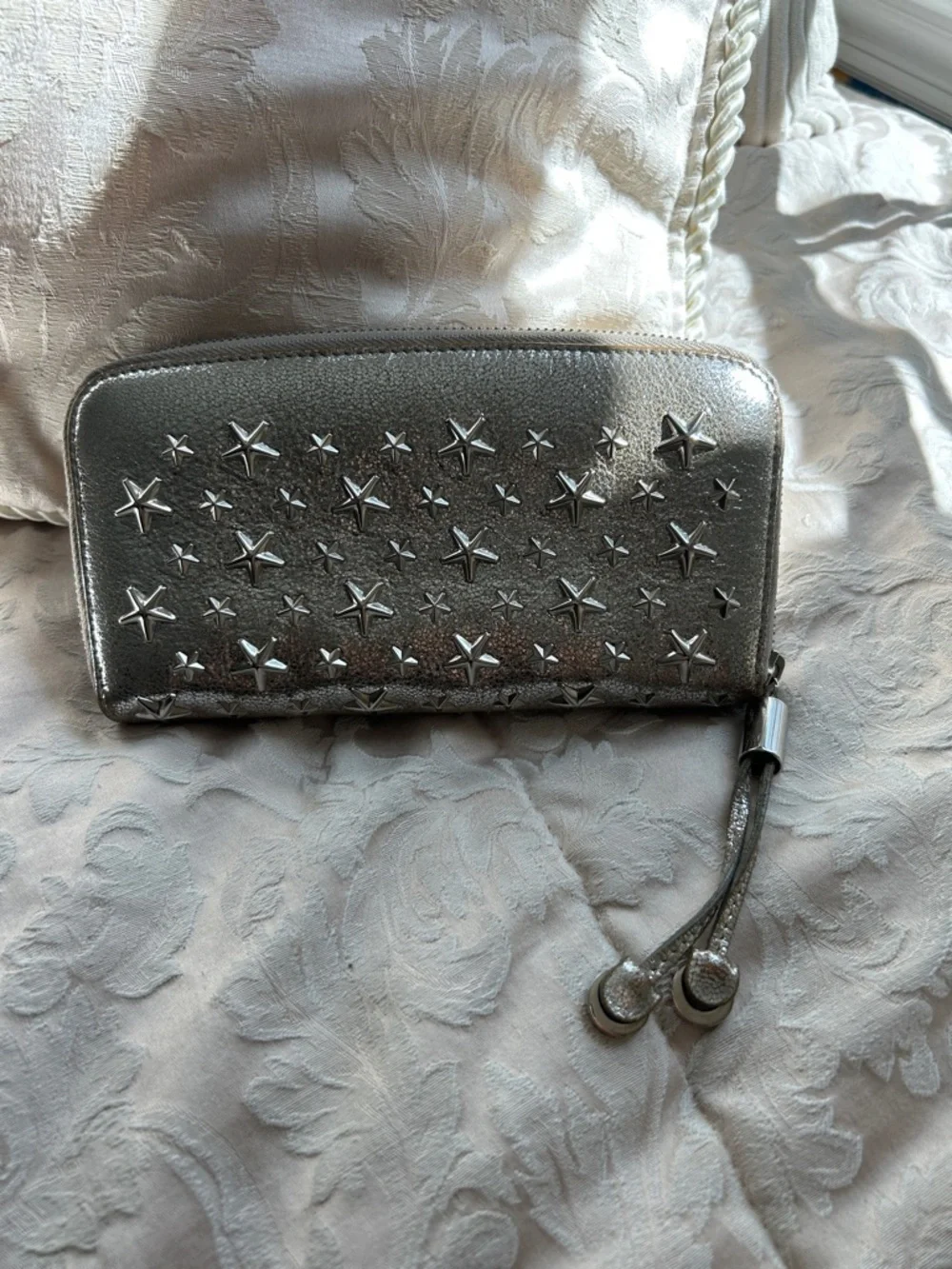 7021. Jimmy Choo Filipa Metallic Silver Star-Embellished Zip Around Wallet